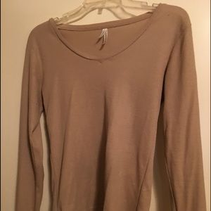 Thermal shirt and one purple pleaded blouse